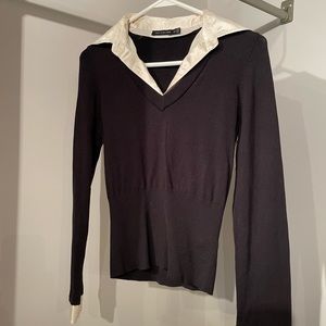 Made by The Limited, this beautiful sweater shirt is made up of cotton and silk.